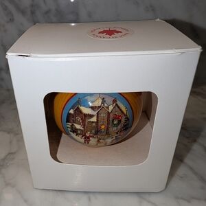 2009 Festive Christmas Ornament with Village Santa Scene Château Laurier